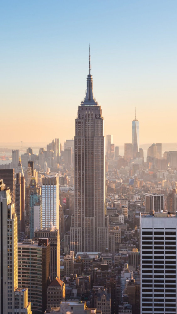 new,york,city.,manhattan,downtown,skyline,with,illuminated,empire,state